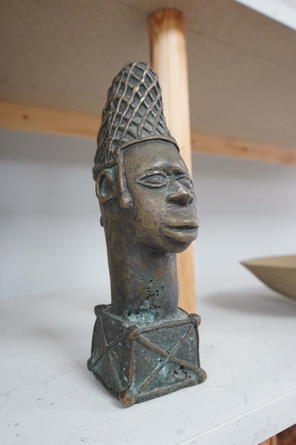 A Benin style bronze bust, 24cm